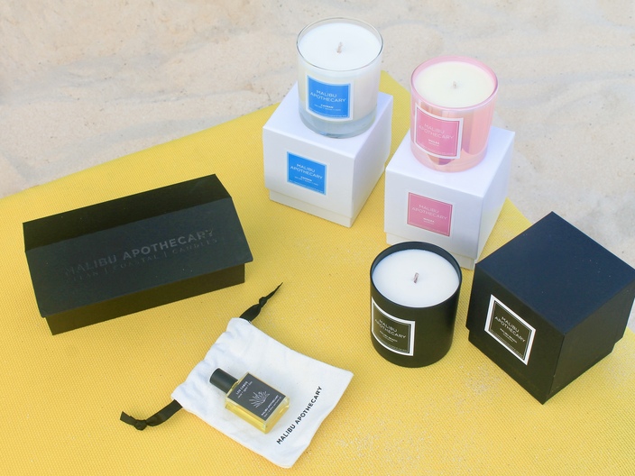 Clean california inspired candles in Anguilla in black, pink, and clear